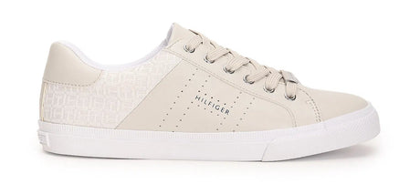 White sneaker with brand logo on a white background